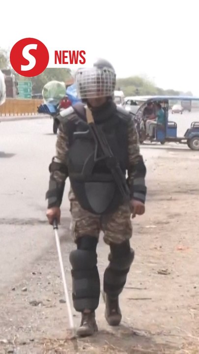 Police vehicles torched as protests against land law turn ugly in India