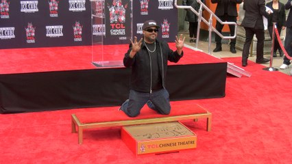 Ice Cube immortalized in cement at the world famous TCL Chinese Theatre