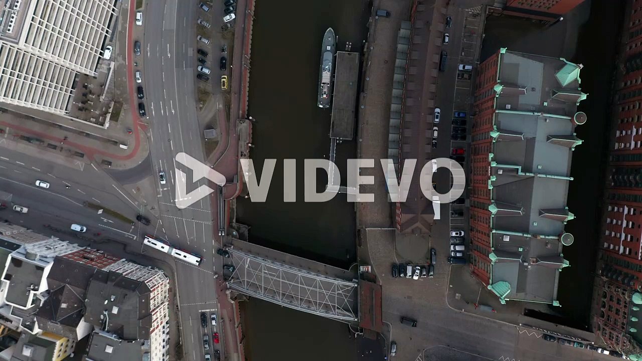 Overhead top down aerial view of cars and traffic by Elbe river canal in Hamburg city center