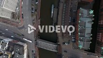 Overhead top down aerial view of cars and traffic by Elbe river canal in Hamburg city center