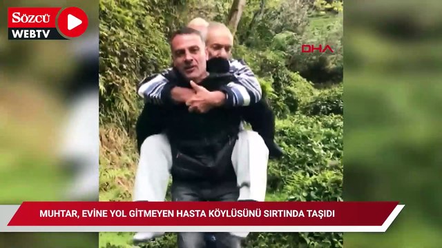 Muhtar, evine yol gitmeyen hasta köylüsünü sırtında taşıdı