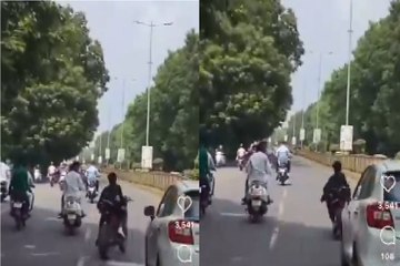 कट मार मार कर बाइक चला रहा युवक