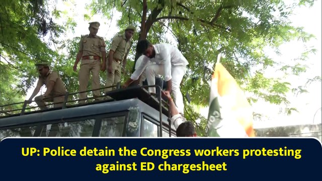 Lucknow (UP): Police detain the Congress workers protesting against ED chargesheet
