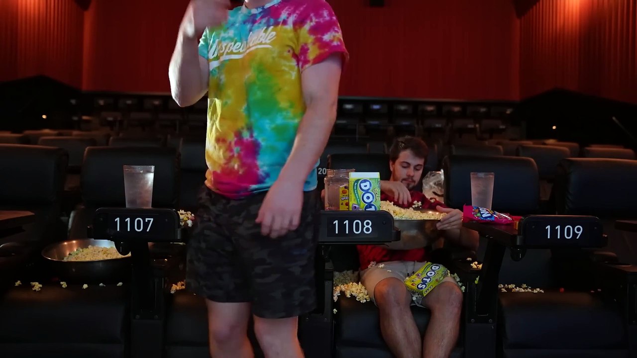 SNEAKING Into a Movie Theater FOR 24 HOURS! 🎥🚨⏳