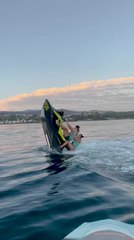 Duo Hilariously Falls Into Water as Jet Ski Tips Over