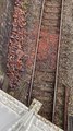 Debris on the railway track after a traffic accident knocked a wall off a bridge