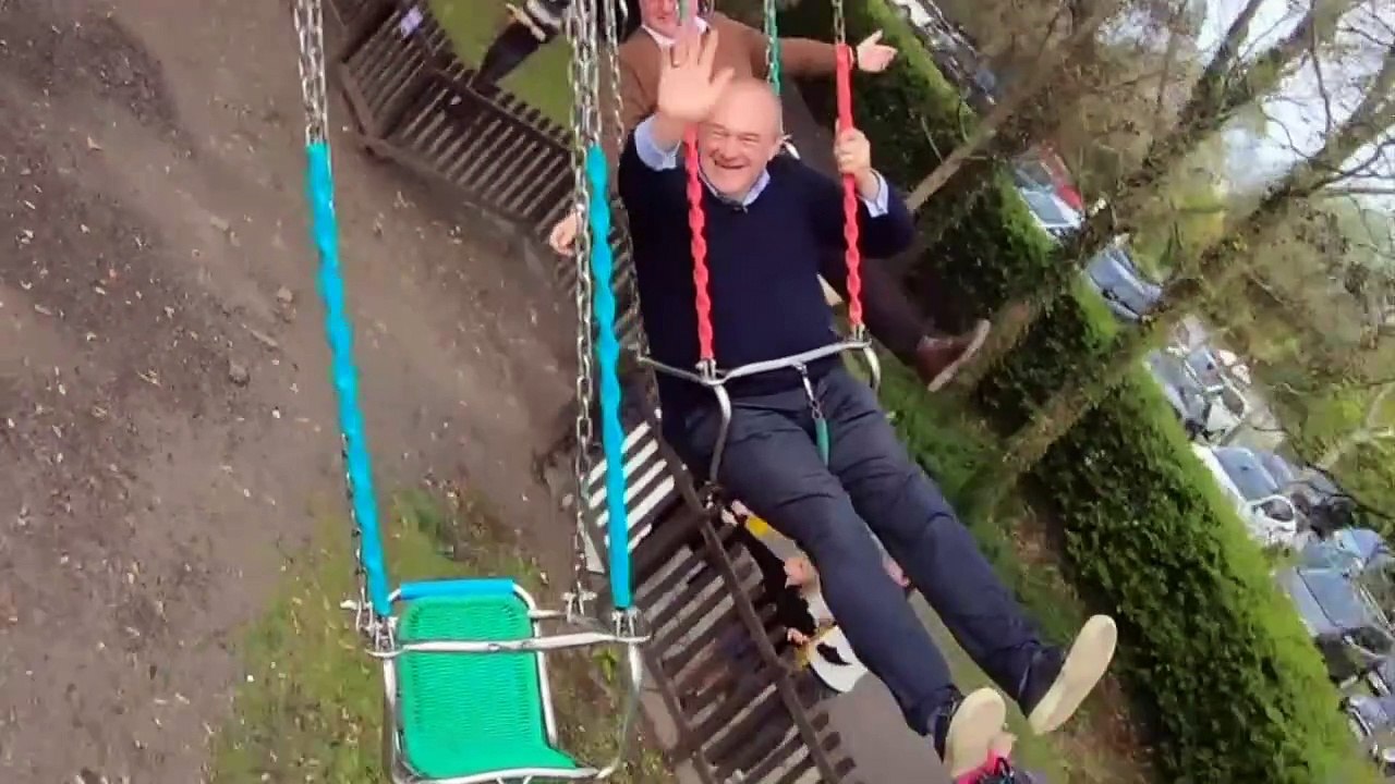 Ed Davey enjoys rollercoaster ride and bouncy castle