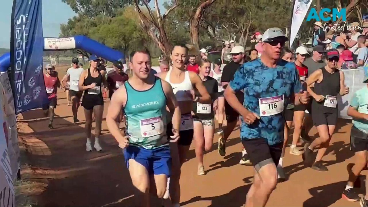 Joggers take to lake for 50th running of Bacchus on the Lake