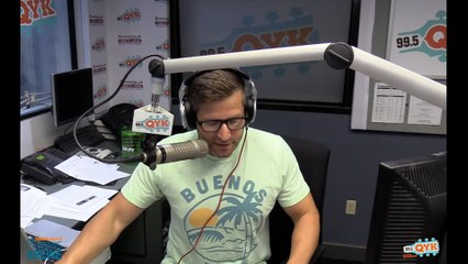 Reporter gets hit by sprinkler