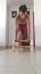 Wooden Bar Flips During Handstand, Causing Man Fall Hard on His Back