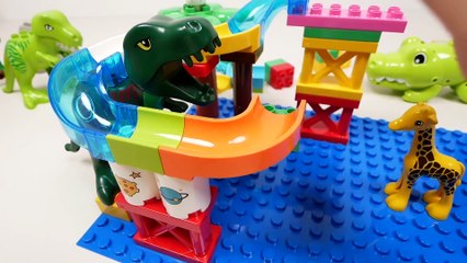 Building Tracks At Dinosaur Park  [Blocks And Marbles]