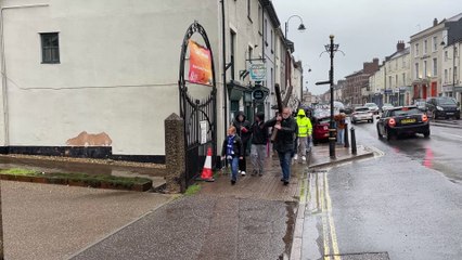 Entering Crediton Congregational Church during Good Friday Walk of Witness (Will Goddard, Crediton Courier)