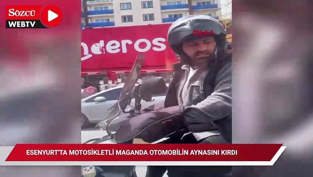 Esenyurt'ta motosikletli maganda otomobilin aynasını kırdı