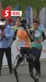 China pits humanoid robots against humans in half-marathon