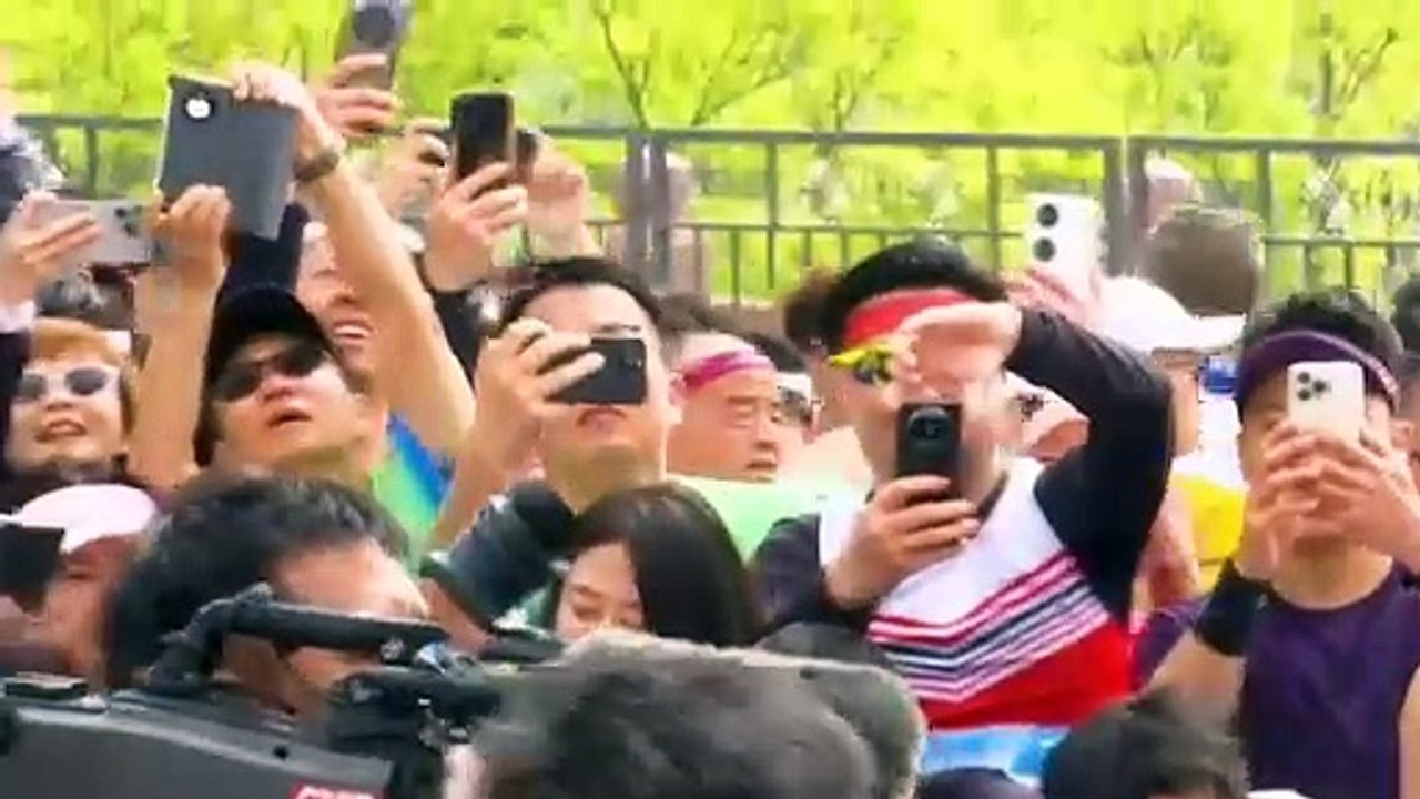 Humanoid robots race humans in a half-marathon in Beijing