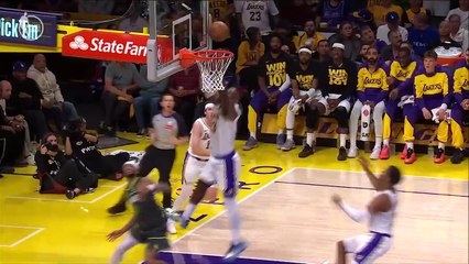 LeBron leaps out of nowhere for crazy block