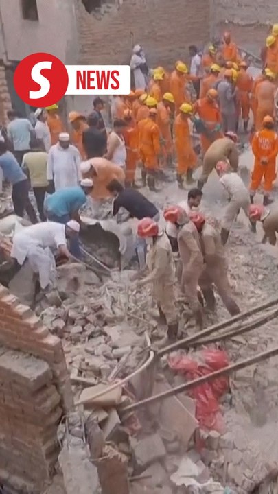 At least 11 killed in India building collapse