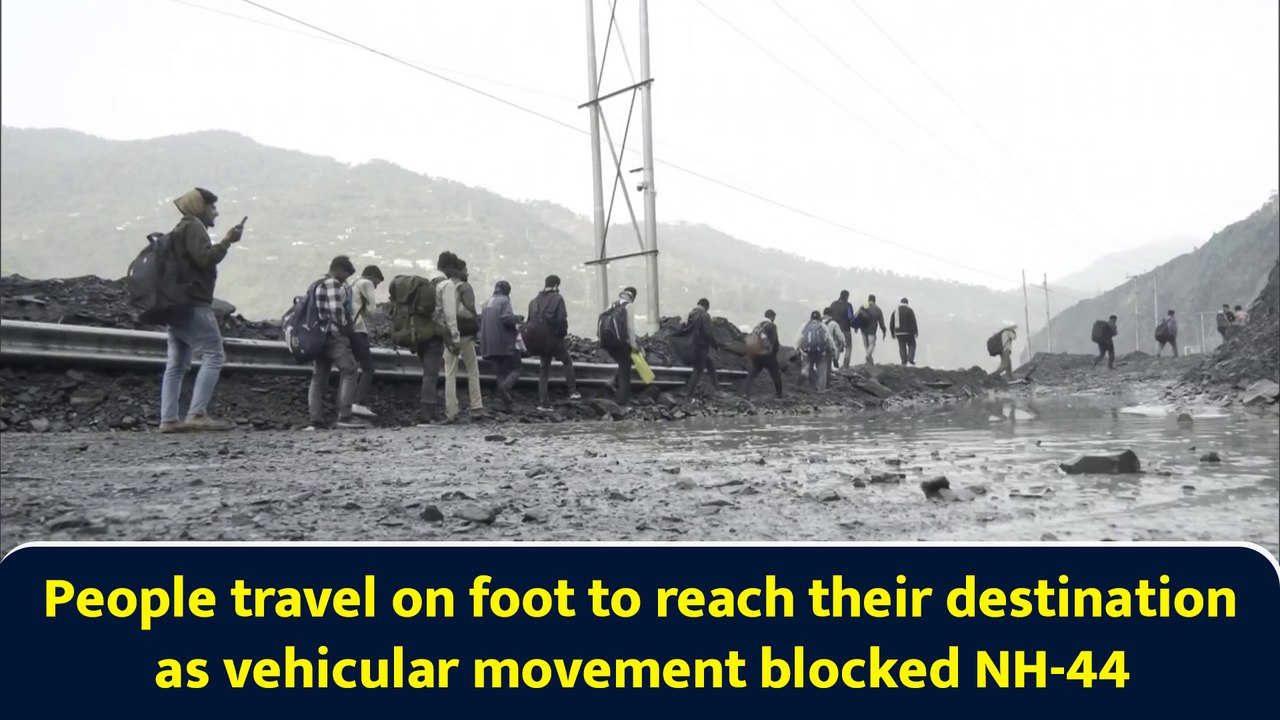 People travel on foot to reach their destination as vehicular movement blocked NH-44