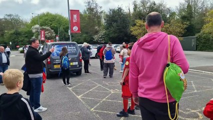 Crawley Town players sign autographs before Exeter City clash