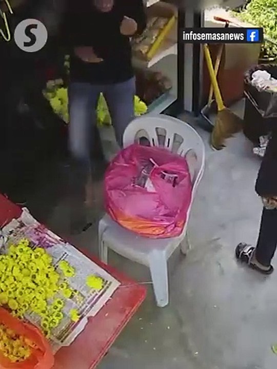 Police looking for men who robbed woman in flower stall