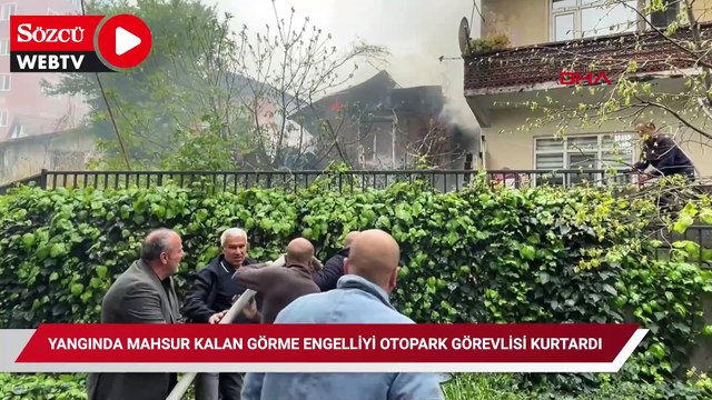 Yangında mahsur kalan görme engellinin yardımına otopark görevlisi koştu