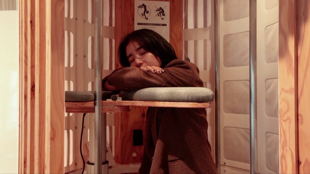 This Cafe in Tokyo Features These Crazy Stand-Up Napping Pods