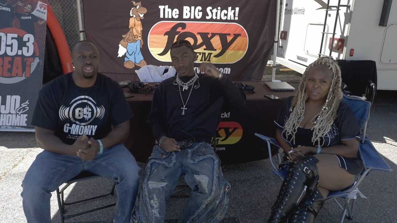 Chase Shakur with the Foxy 99 Team at Dreamville Festival 2024