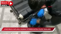 Uyuşturucu haplarla kaçmak isterken kapıda polise yakalandı
