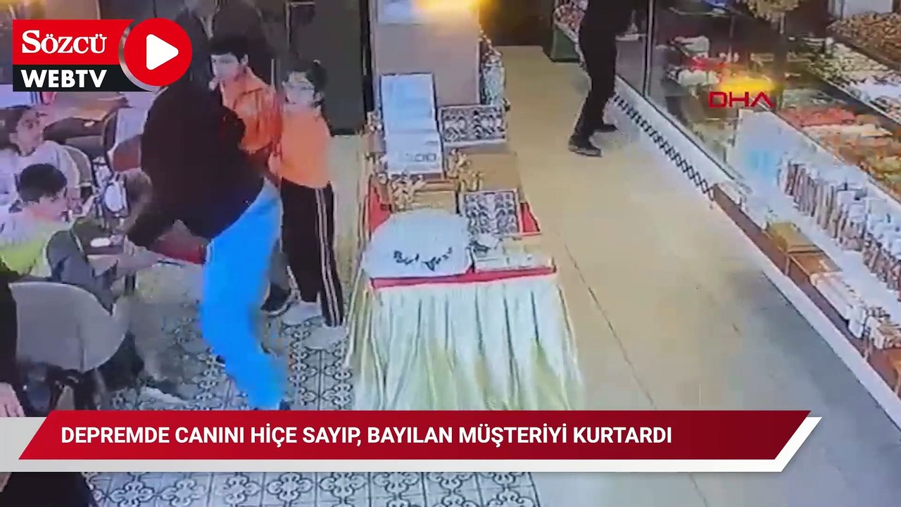 Depremde canını hiçe sayıp, bayılan müşteriyi kurtardı