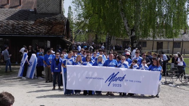 Holocaust survivors march to Auschwitz crematorium 80 years after camp's liberation