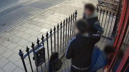 Moment "kids" try and break into restaurant - before neighbour scares them off