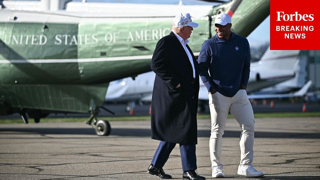 President Trump Exits Helicopter And Walks With Philadelphia Eagles Running Back Saquon Barkley