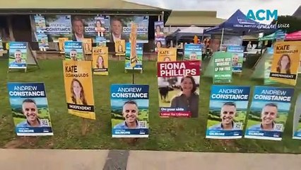 Early Voting polls littered with signage in Gilmore