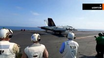 F/A-18E Super Hornet stijgt op van vliegdekschip tijdens bezoek van Amerikaanse generaal