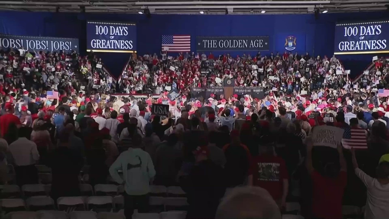 Trump receives fiery welcome in Michigan for his 100-day celebration