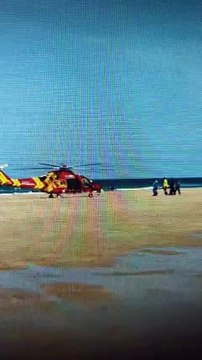 Cornwall Air Ambulance airlifts an injured surfer from Fistral Beach