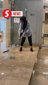 Fire system pipe bursts at Menara Kinabalu flooding lifts and stairwell