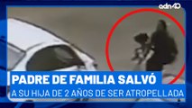 ¡Por poquito! Padre de familia salvó a su hija de dos años de ser atropellada