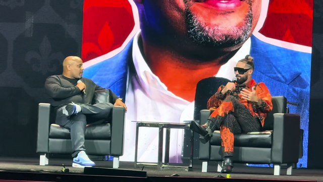 Daniel Cormier interviews Seth Rollins during WWE Panel