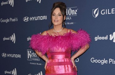 Kacey Musgraves has insisted she hasn't totally quit marijuana