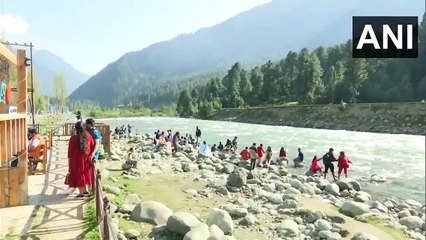 Tourists continue to arrive in Pahalgam to enjoy the scenic beauty of the town.