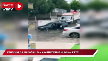 Kendisine silah doğrultan kayınpederine müdahale etti; o anlar kamerada