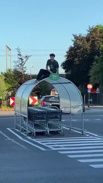 Man Accidentally Destroys Shopping Cart Shelter In Sudden Mishap