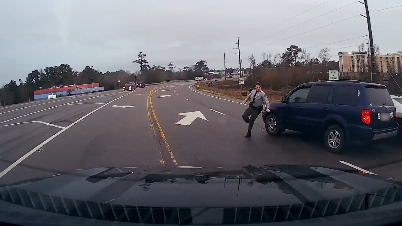 Car Strikes Cop Car Door While Taking Turn