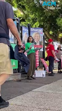 Long queues at polling booths as election day comes to a close for Australians