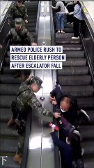Armed police leap onto escalator to rescue falling elderly person