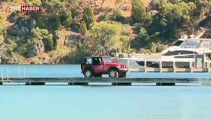 Polisten kaçarken araçla suya düştü