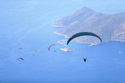 Binlerce turist gökyüzüyle buluşuyor! Ölüdeniz'in eşsiz manzarasıyla uçuş keyfi