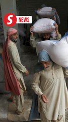 Food rations distributed in Pakistan-controlled Kashmir areas in range of possible shelling