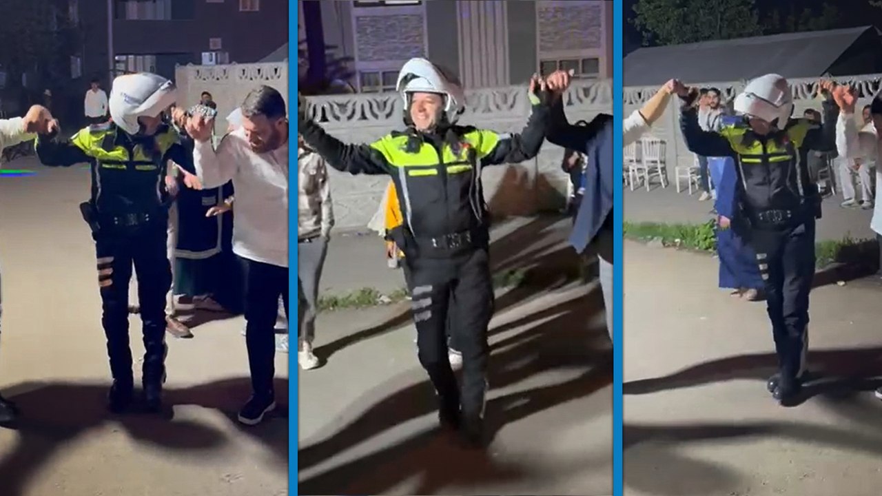 Düğün konvoyundaki araçları yoldan kaldıran polis, davet üzerine halaya katıldı